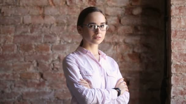 Young professional businesswoman or successful student smiling looking at camera — Stock Video