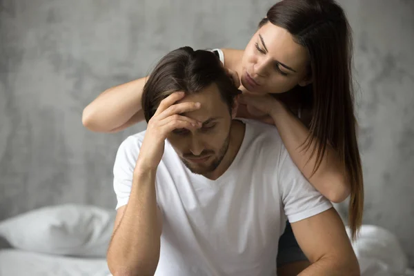 Young woman embracing upset offended man apologizing, asking for — Stock Photo, Image