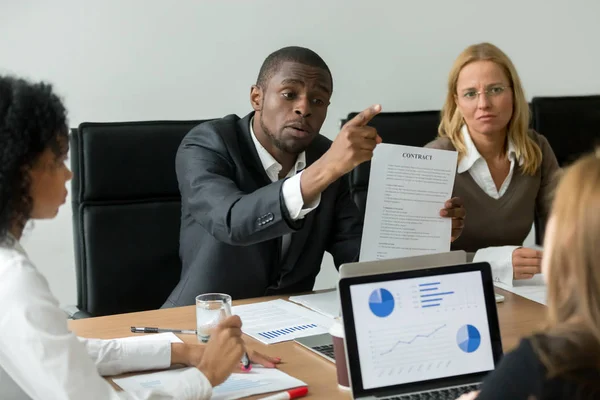 Angry african businessman arguing about bad financial contract, — Stock Photo, Image