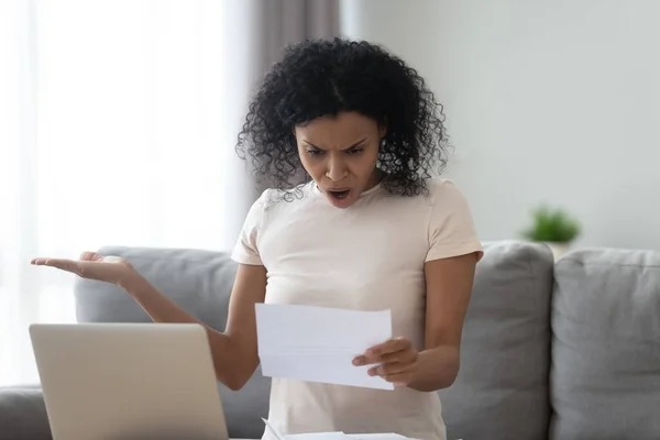 Angry black woman feel confused with postal letter news
