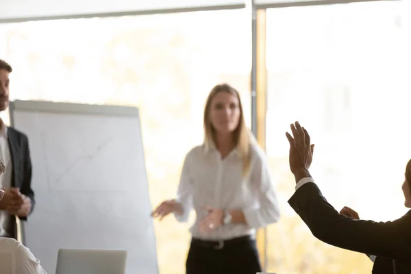 Motivated employee raise hand interacting with coach — Stock Photo, Image