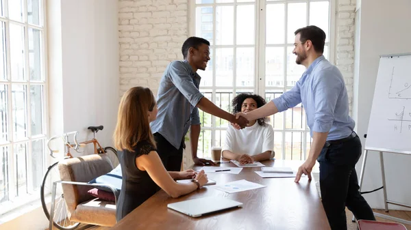 Boss making agreement with client or praising employee at office. — Stock Photo, Image