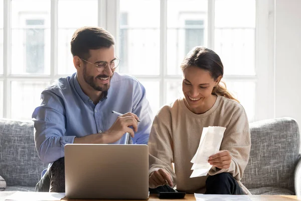 Happy young family couple planning monthly budget. — Stock Photo, Image