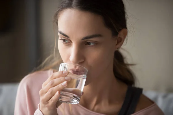 Close up of girl drinking water feeling thirsty — Stock Photo, Image