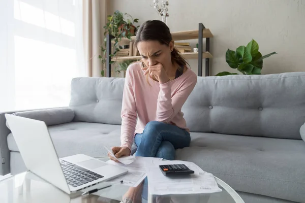 Pensive woman thinking managing family utility bills — ストック写真