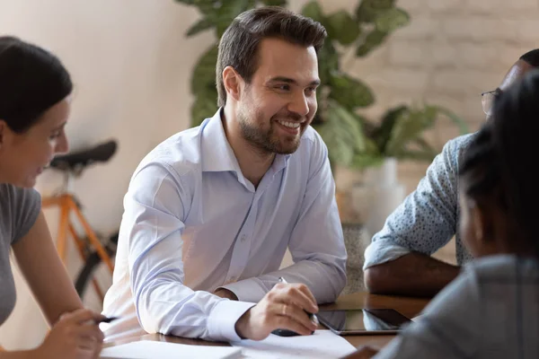 Happy young male team leader satisfied with great project results. — Stock Photo, Image