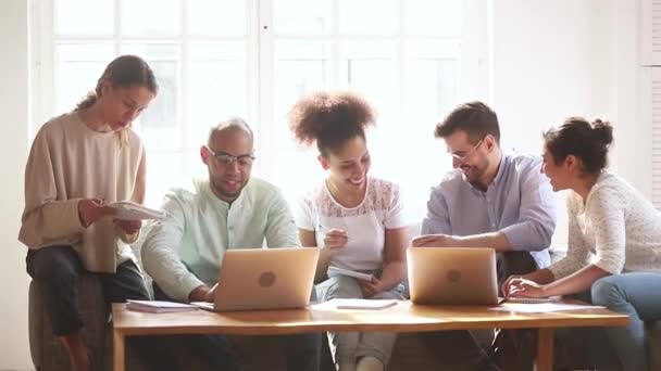 Happy multi ethnic students group study with laptops make notes — Stock Video