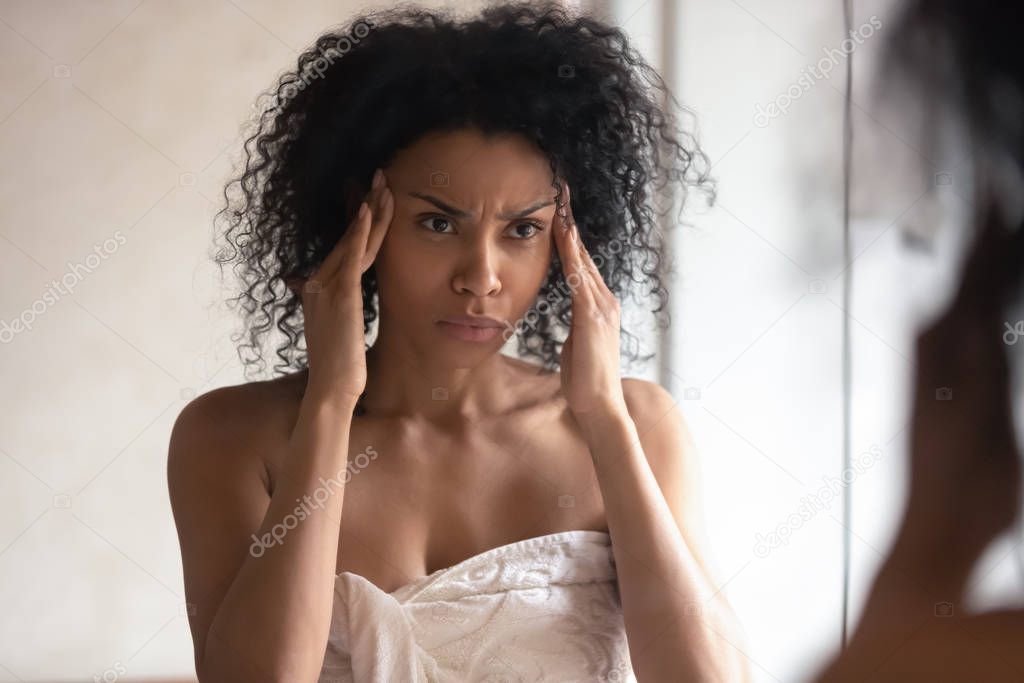 African American woman worry about facial wrinkles