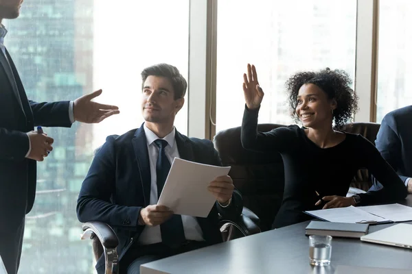 African American female employee raise hand at team meeting — Stock Photo, Image