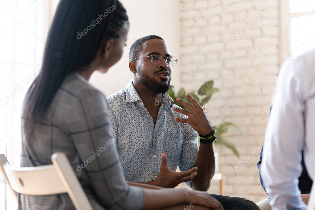African American man speak at group therapy session