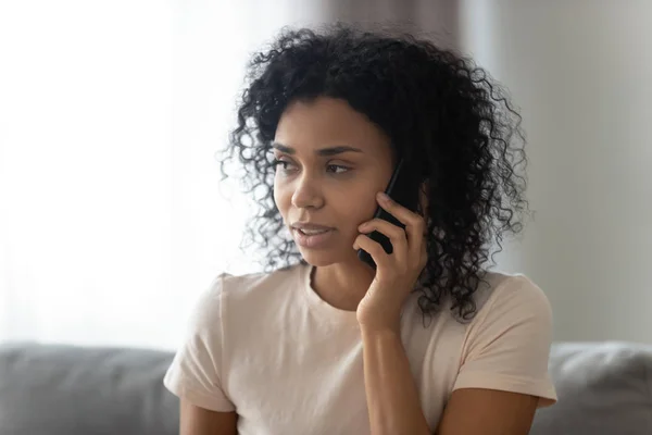 Headshot portrait african 30s woman talking on phone — Stock Photo, Image