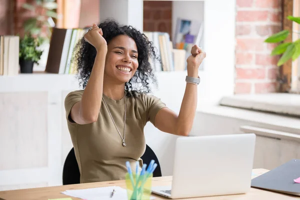 Excited black woman feel euphoric reading god news online — ストック写真