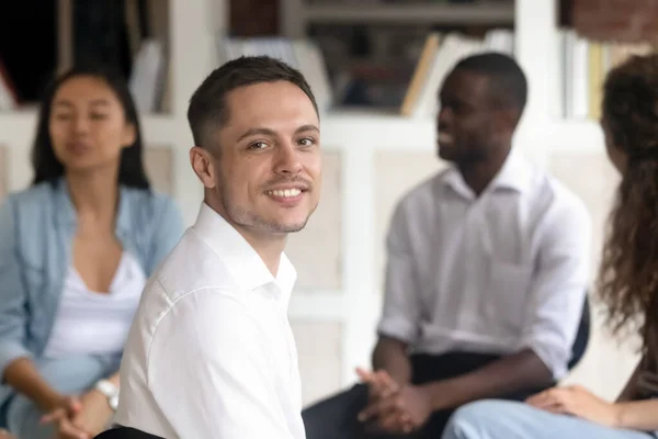 Relieved Caucasian man posing at group therapy session — Stock Photo, Image