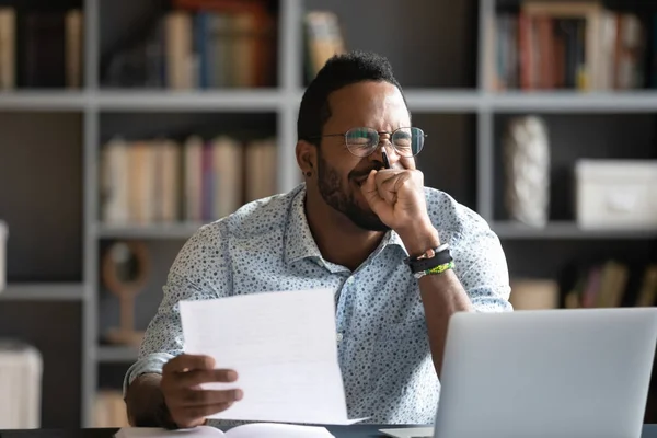 Happy african worker feel glad receive good news in letter — Stock Photo, Image