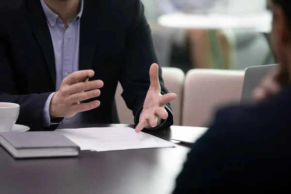 Close up businessman negotiating explaining agreement details to partner. — Stock Photo, Image