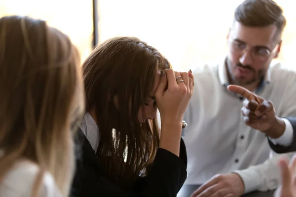 Woman feels stressed suffers from bad attitude discrimination of colleagues — Stock Photo, Image