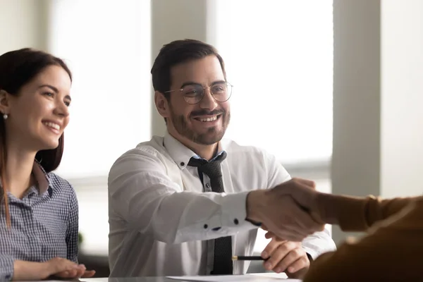 Caucasian boss greeting African ethnicity applicant before begin job interview — Stock Photo, Image