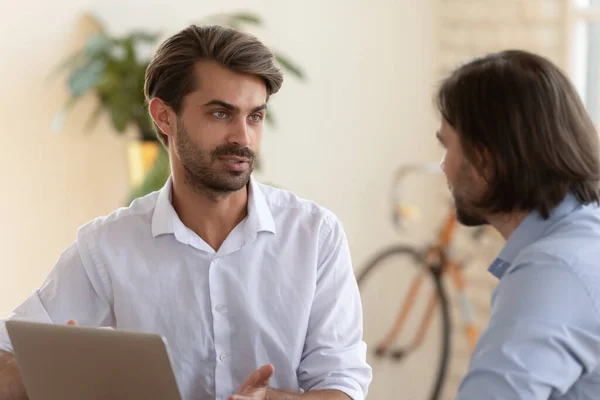 Male colleagues talk brainstorm at business meeting in office — Stock Photo, Image