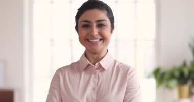 Happy confident indian businesswoman showing thumbs up hand gesture