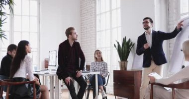 Male worker offering good idea give fist bump to coach