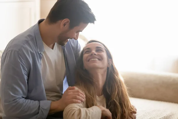 Happy young couple cuddle enjoying weekend together — Stock Photo, Image