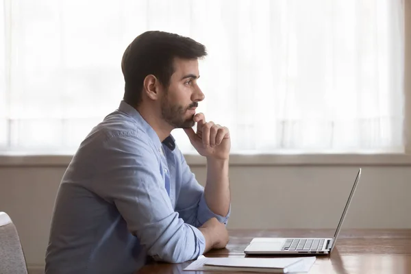 Pensive male look in distance thinking of problem solution — Stock Photo, Image