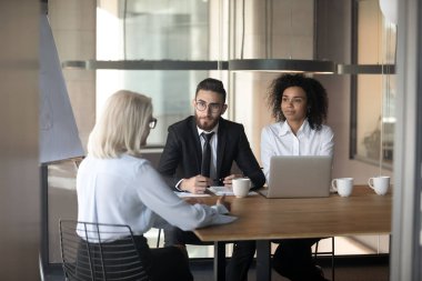 Job interview lead diverse HR managers in applicant elderly woman