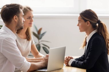 Two serious hr managers listening to candidate on job interview