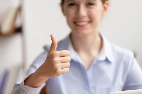 Close up smiling businesswoman showing thumbs up, satisfied client — Stock Photo, Image
