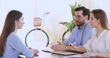 Hr management team interviewing female job seeker, recruiting concept