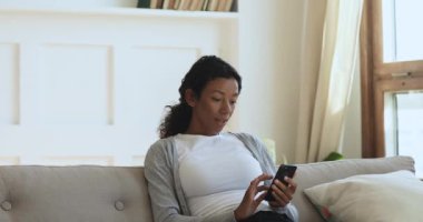 Euphoric young african american girl received winner notification.