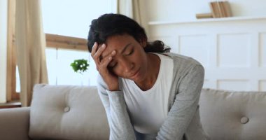 Frustrated young african ethnicity woman feeling depressed,