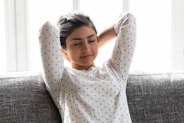 Serene girl closed eyes put hands behind head enjoy relaxation — Stock Photo, Image