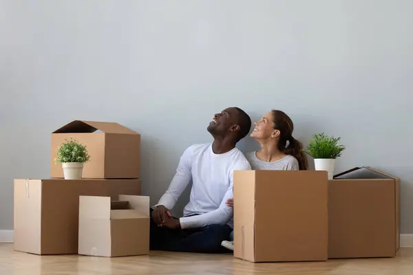 African American couple in new apartment looking at copy space — Zdjęcie stockowe