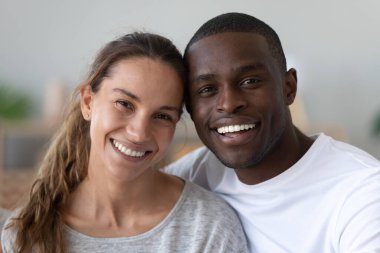 Head shot portrait happy smiling African American man and woman