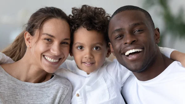 Head shot portrait smiling African American mother, father and son — Stock Photo, Image