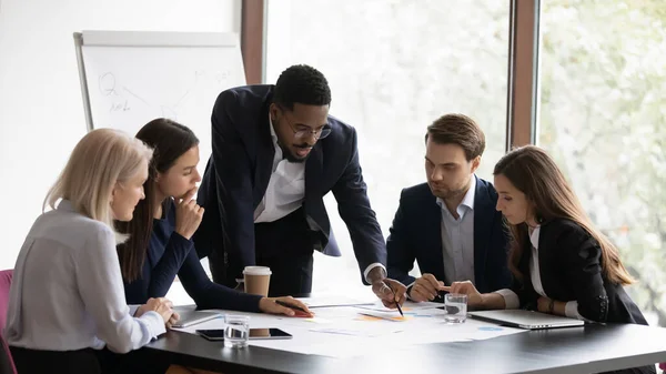 Confident biracial businessman head meeting with diverse colleagues — Stock Photo, Image
