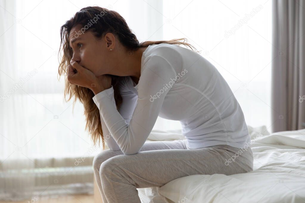 Upset girl look in distance suffering from lifestyle problems