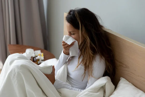Sick young woman feel ill resting at home — Stock Photo, Image