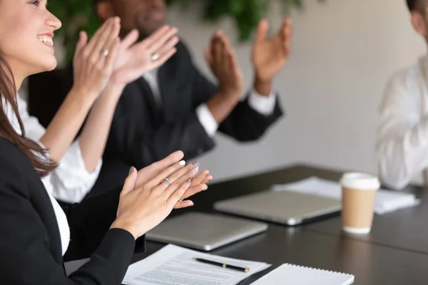 Close up overjoyed female male coworkers applauding. — Stock Photo, Image