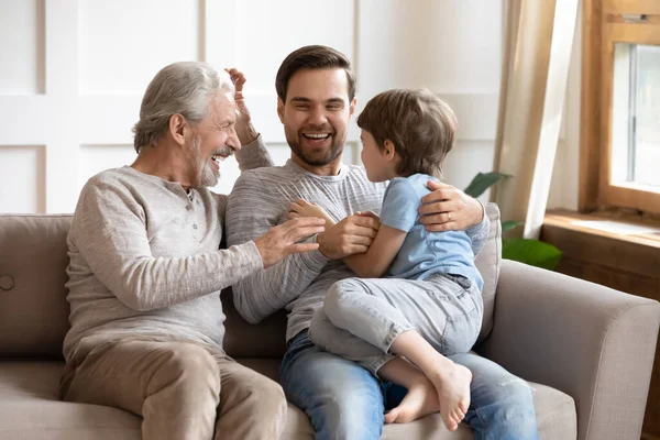 Happy three generations of men have fun at home — Stock Photo, Image