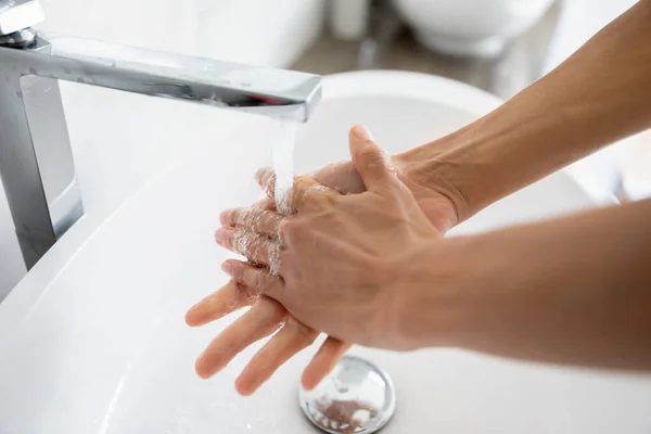 After toilet woman wash her arms using antibacterial soap closeup — Stock Photo, Image