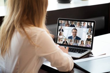 People engaged in group videocall, laptop screen webcam application view clipart