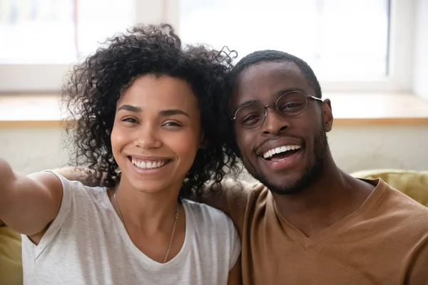 Close up headshot portrait of African American couple taking selfie. — Stock Photo, Image