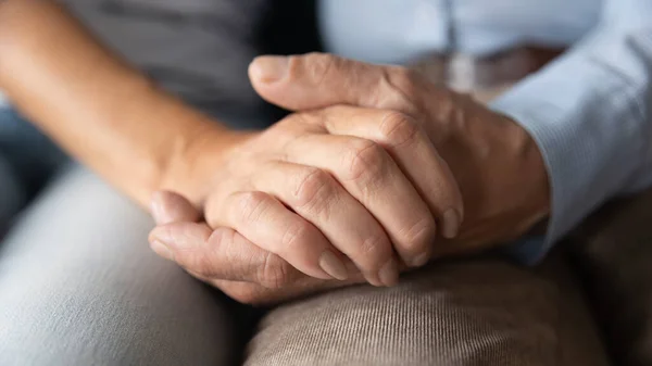 Close up mature senior family holding hands — Stock Photo, Image