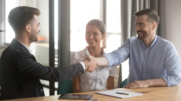 Successful businessmen starting negotiations greeting each other shaking hands — Stock Photo, Image