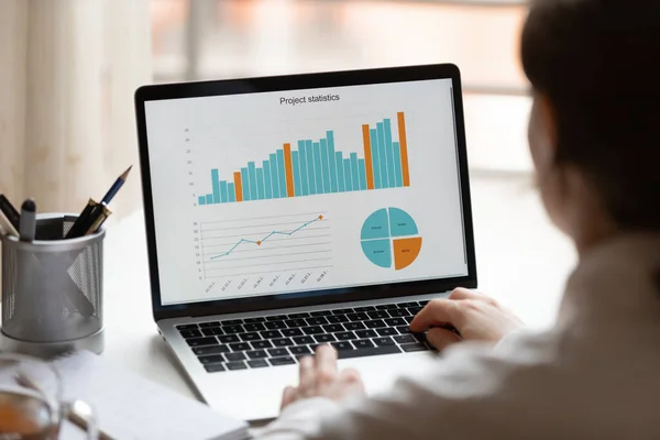 Female employee work distantly on laptop from home — Stock Photo, Image