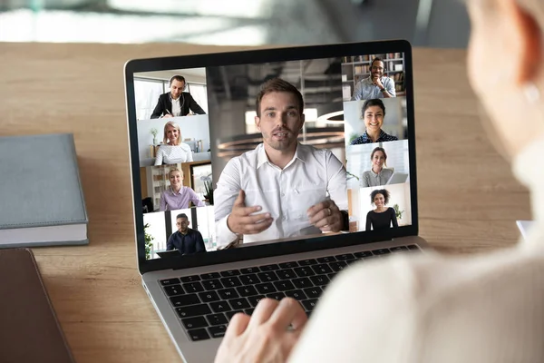 Female employee talk on video call with diverse colleagues — Stock Photo, Image