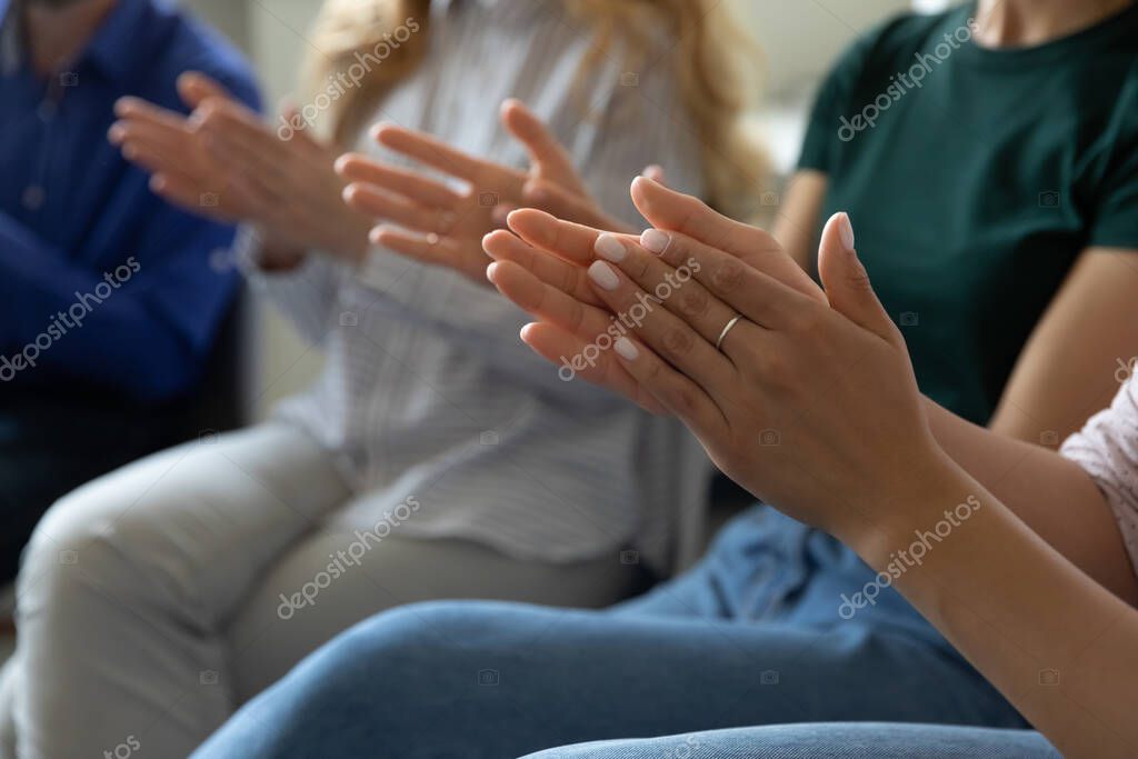depositphotos_369448110-stock-photo-close-up-female-hand-applauding.jpg