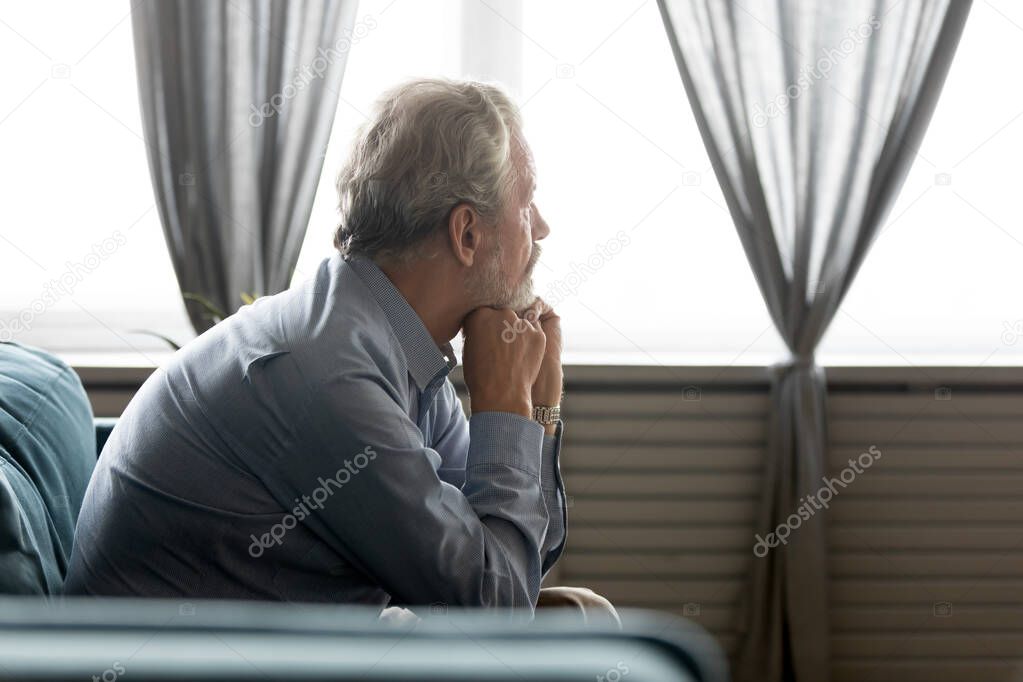 Pondering old senior hoary man thinking of psychological health problems.